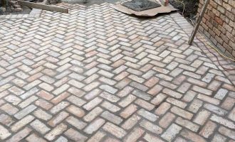 Brick walkway installation in Dallas by our hardscape expert1