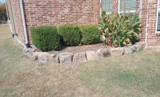 Stonework and boulder edging Wylie